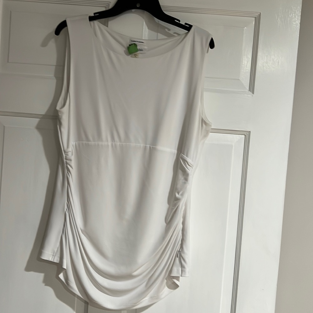 Calvin Klein Top. White. Zips on the side. Slightly Fitted under bodice. XL